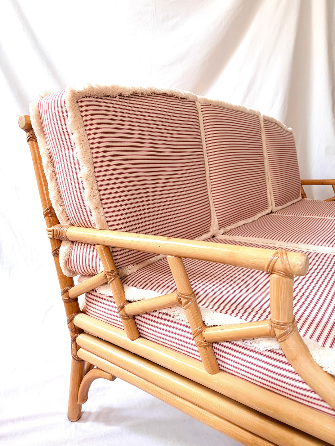 Vintage Cane Sofa with Striped Cushions