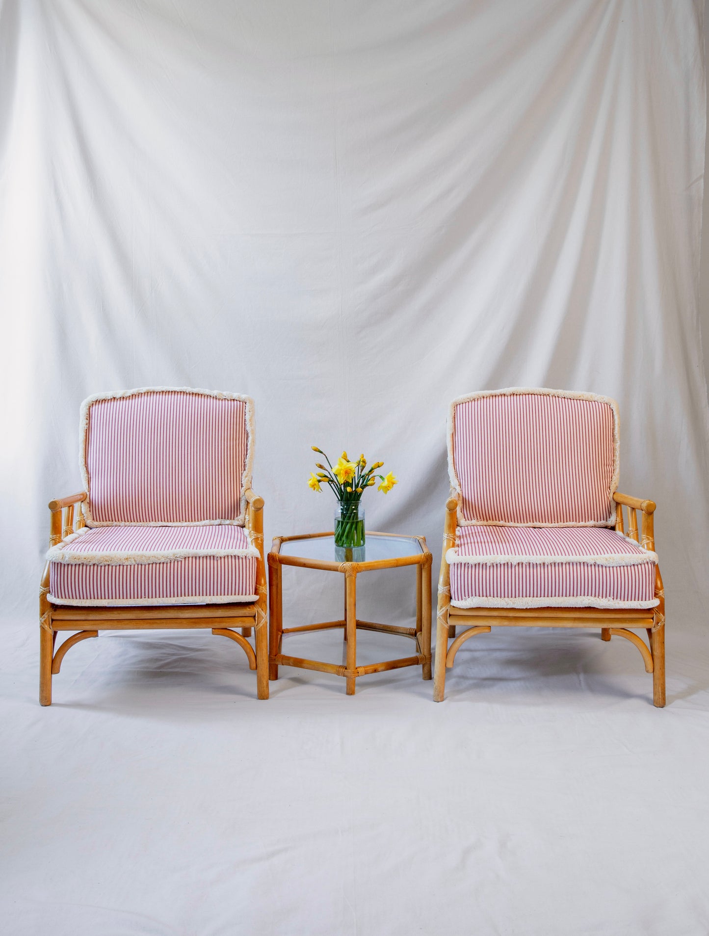 Pair of Vintage Cane Armchairs with Striped Cushions and Side Table (Set)