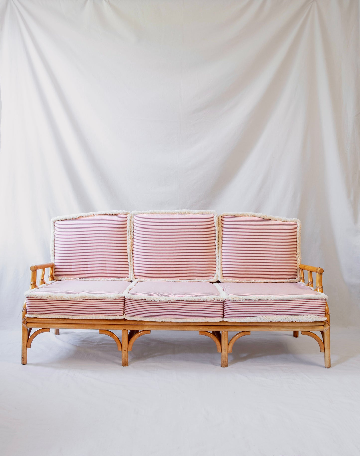 Vintage Cane Sofa with Striped Cushions
